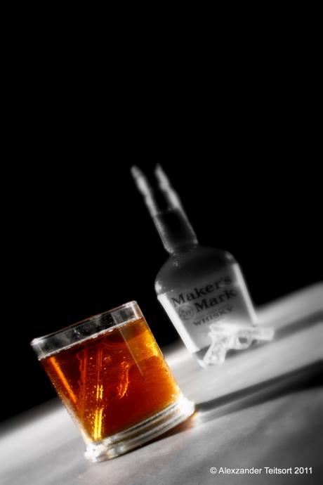 Maker's Mark Whiskey With Glass/Guns Black and White Bottle Black background